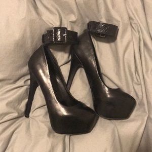 Black Steve Madden heels with ankle strap.
